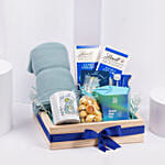 سلة هدية للمريض تحتوي شاي بابونج وعسل وبطانية وكوكيز ومج