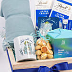 سلة هدية للمريض تحتوي شاي بابونج وعسل وبطانية وكوكيز ومج