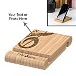 حامل موبايل وتابليت خشبي محفور عليه حسب الطلب