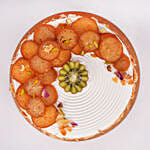 Rakhi Special Half Kg Vanilla Cake Topped With Gulab Jamun And Kiwi