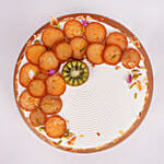Rakhi Special One Kg Vanilla Cake Topped With Gulab Jamun And Kiwi