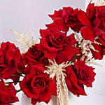 Red Rose Flower Arrangement in White Ceramic Vase