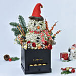 ورد على شكل رجل ثلج في صندوق أسود وشوكولاتة فيريرو روشيه