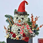 ورد على شكل رجل ثلج في صندوق أسود وشوكولاتة فيريرو روشيه