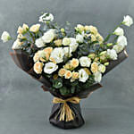 باقة ورد بيبي روز وليسانتوس في لفة رمادية