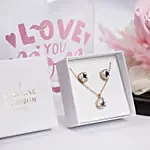 طقم كارولين سفيدبوم سواروفسكي مع ورده أبدية