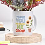 هدايا يوم المعلم - ورد في كوب أبيض مطبوع ودفتر ملاحظات