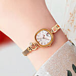 Titan Raga Delight Pink Dial Analog Watch for her - Paired with a Multicolor Flower Bouquet