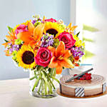 Vivid Bunch Of Flowers With Cake