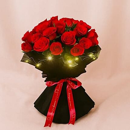 Red Rose Elegance Led Wrapping Bouquet: Send Anniversary Gifts to Saudi Arabia