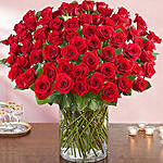 100 Red Roses In A Glass Vase