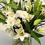 White Flowers In Cylinder Box