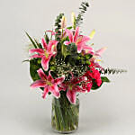 Gorgeous Flowers In Cylinder Vase