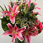 Gorgeous Flowers In Cylinder Vase