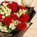 Red Roses And Alstroemeria In Black Wrapping