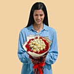 باقة بالشكولاتة والورد الأحمر