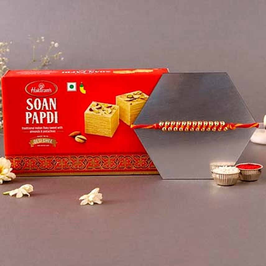 Sneh Elegant Gold Rakhi & Soan Papdi