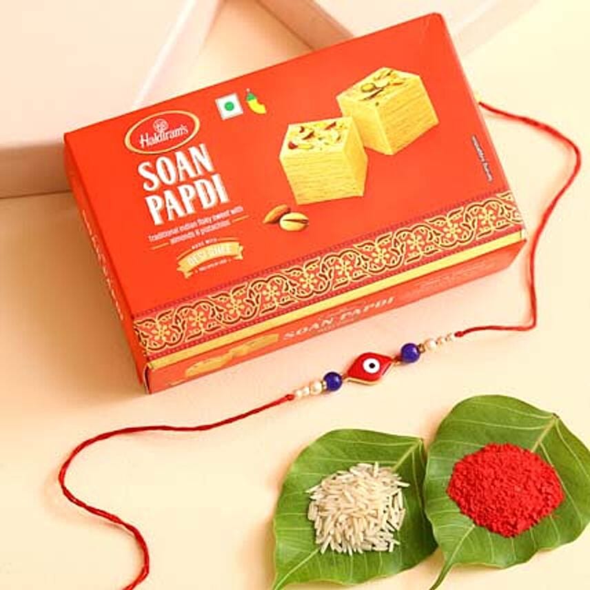 Sneh Evil Eye Red Rakhi & Soan Papdi