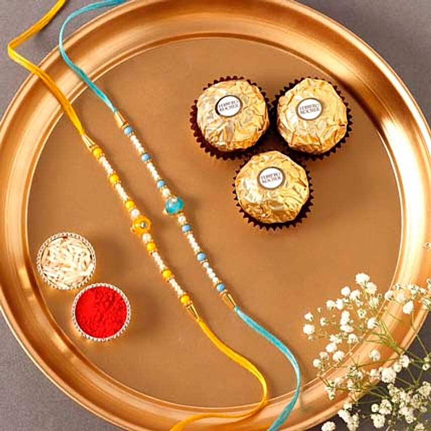 Sneh Vibrant Set Of 2 Pearl Rakhis & Ferrero Rocher