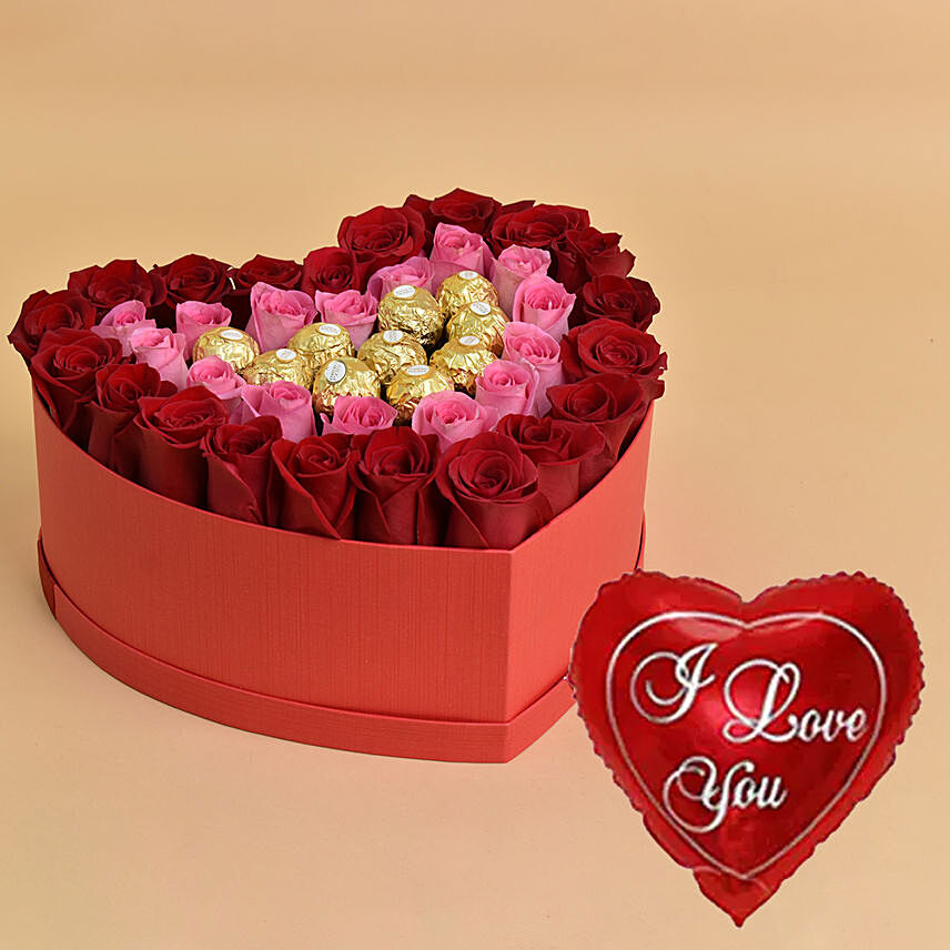 Roses and Chocolate In a Heart Shaped Box With I Love You Balloon