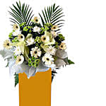 Alluring Mixed Flowers Arrangement In Brown Stand