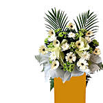 Alluring Mixed Flowers Arrangement In Brown Stand