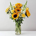 Alluring Mixed Flowers Glass Vase Arrangement