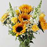 Alluring Mixed Flowers Glass Vase Arrangement