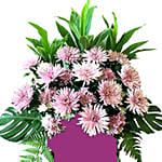 Elegant Pink Flowers Arrangement In Pink Stand