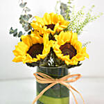 Lovely Sunflowers In Round Glass Vase