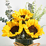 Lovely Sunflowers In Round Glass Vase