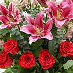 Mixed Roses Stargazer Lilies In Glass Vase Arrangement