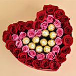 Roses and Chocolate In a Heart Shaped Red Box