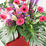 Alluring Mixed Flowers Red Cardboard Stand