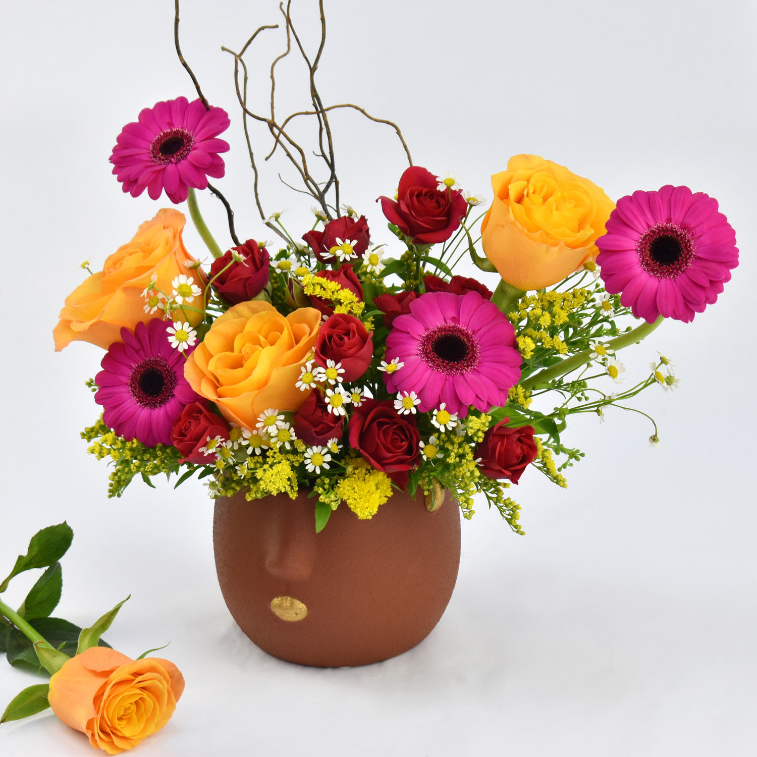 Online Chromatic Flowers Arrangement Gift Delivery in UAE FNP