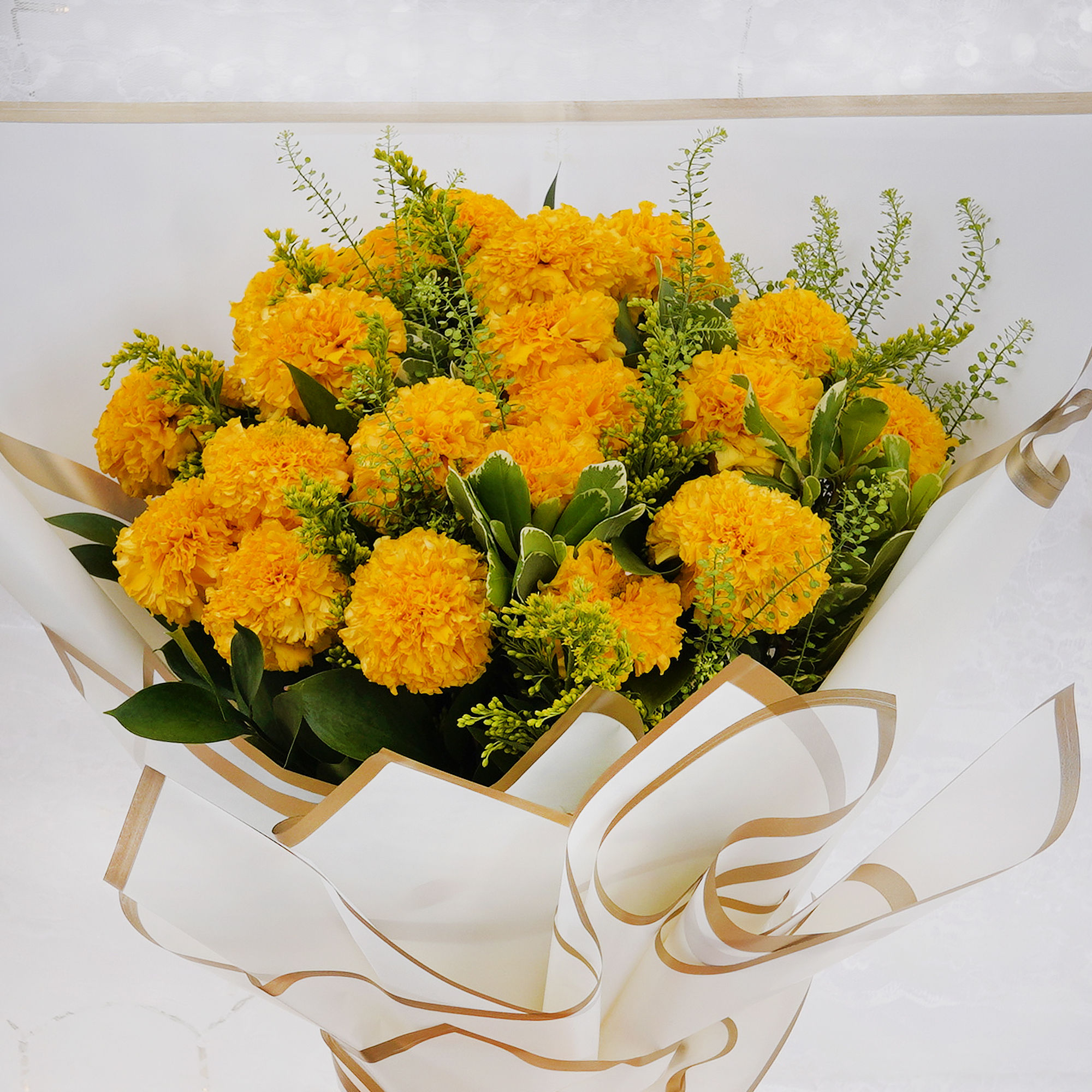 Order Marigold Bouquet and Belgian Chocolates Online | Same-Day